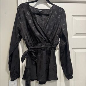 Torrid Black Wrap Blouse with Subtle Skull Design
